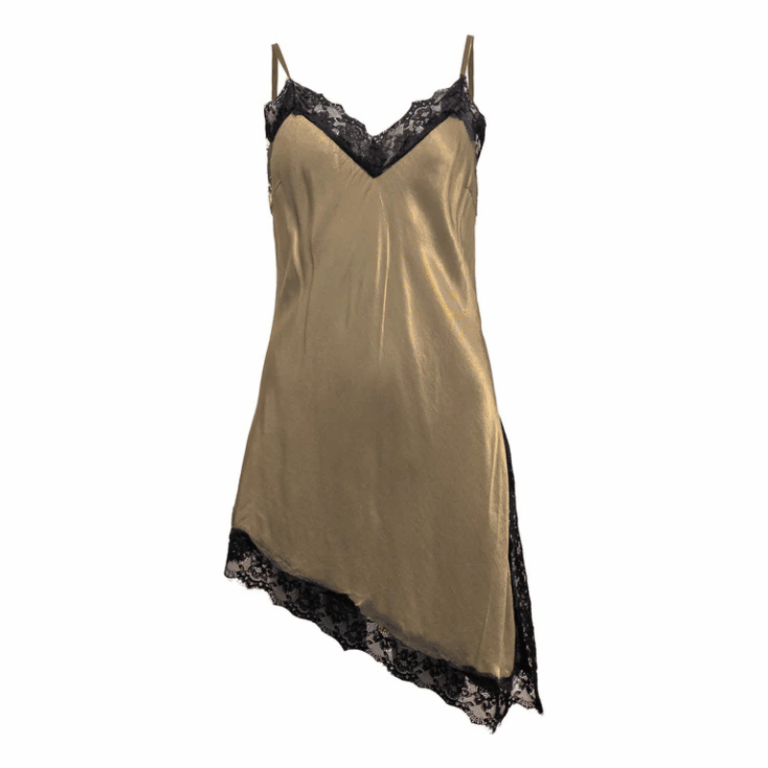 Must have top 700 fra Costa Mani med asymmetrisk kant. Smuk top med blondekant. Farve: choko Kvalitet: 100% viskose